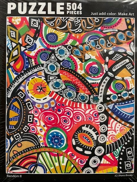 Colorful puzzle 2 packaging with abstract design and 'Puzzle 504 Pieces' text.