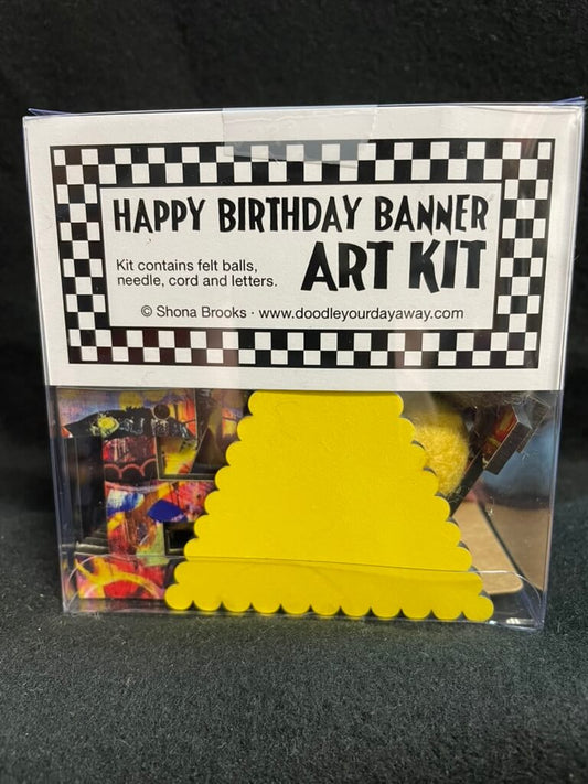 A packaged 'Happy Birthday' themed arts and crafts kit containing yellow felt pieces, cord, and letters, with a label indicating the product information.
